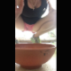 A girl records herself taking a soft, heaping shit into a bowl. Vertical format video. About a minute.